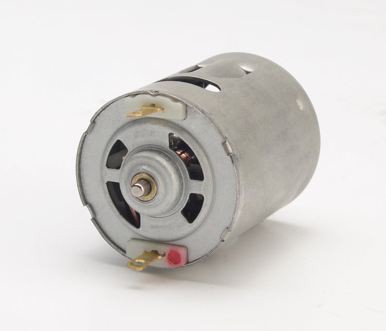 Front view of a brushed DC geared motor with metal cylindrical housing and output shaft