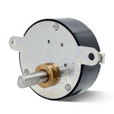 Spur gear drive with dual front shafts and circular metal housing