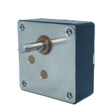 Rectangular speed reduction gearbox with metal front plate and brass shaft collar